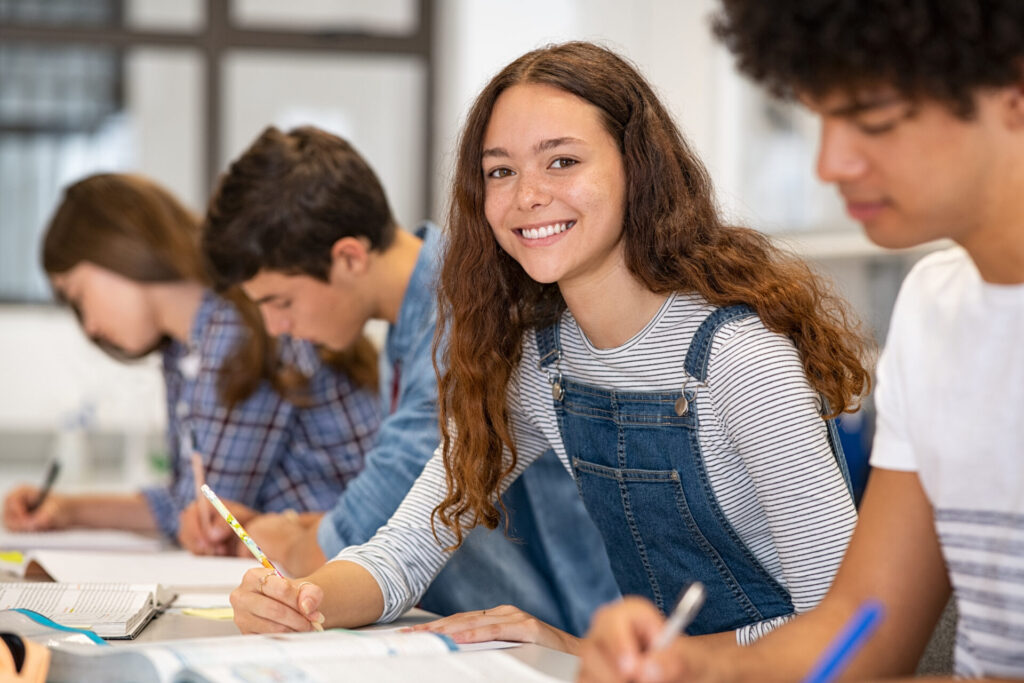 Focused students completing IELTS practice test during IELTS Max preparation programme.