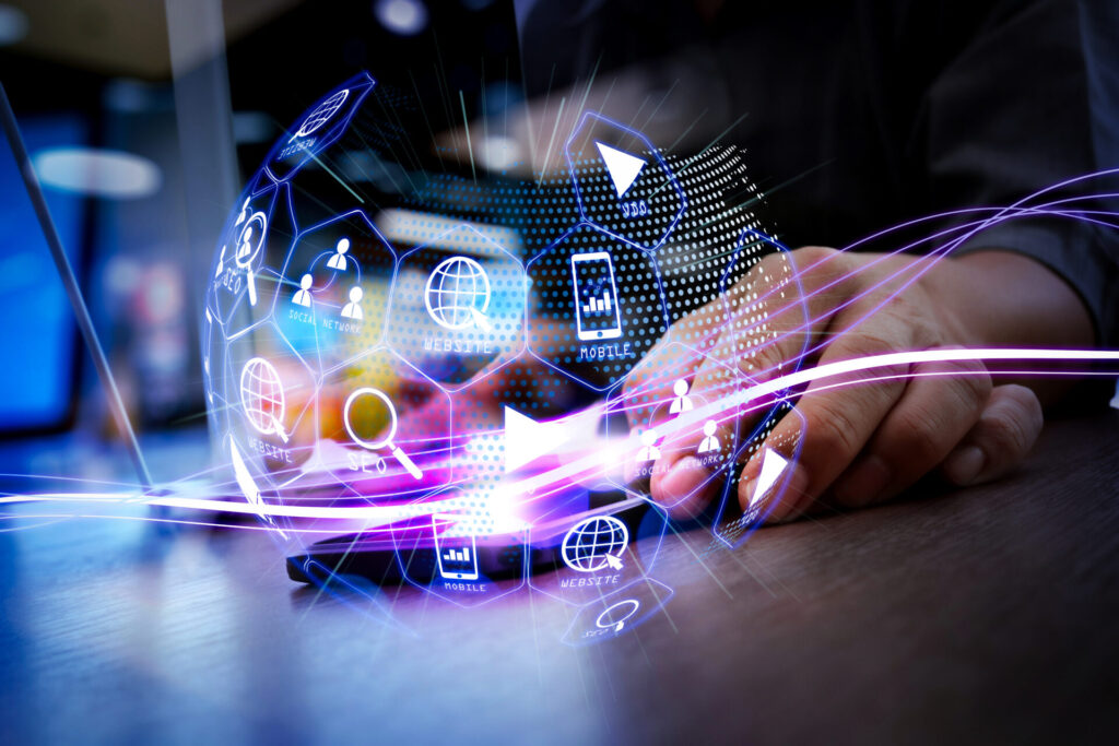 IELTS Media and Advertising digital marketing concept with SEO, social network, mobile advertising, and website icons glowing in a futuristic tech sphere.