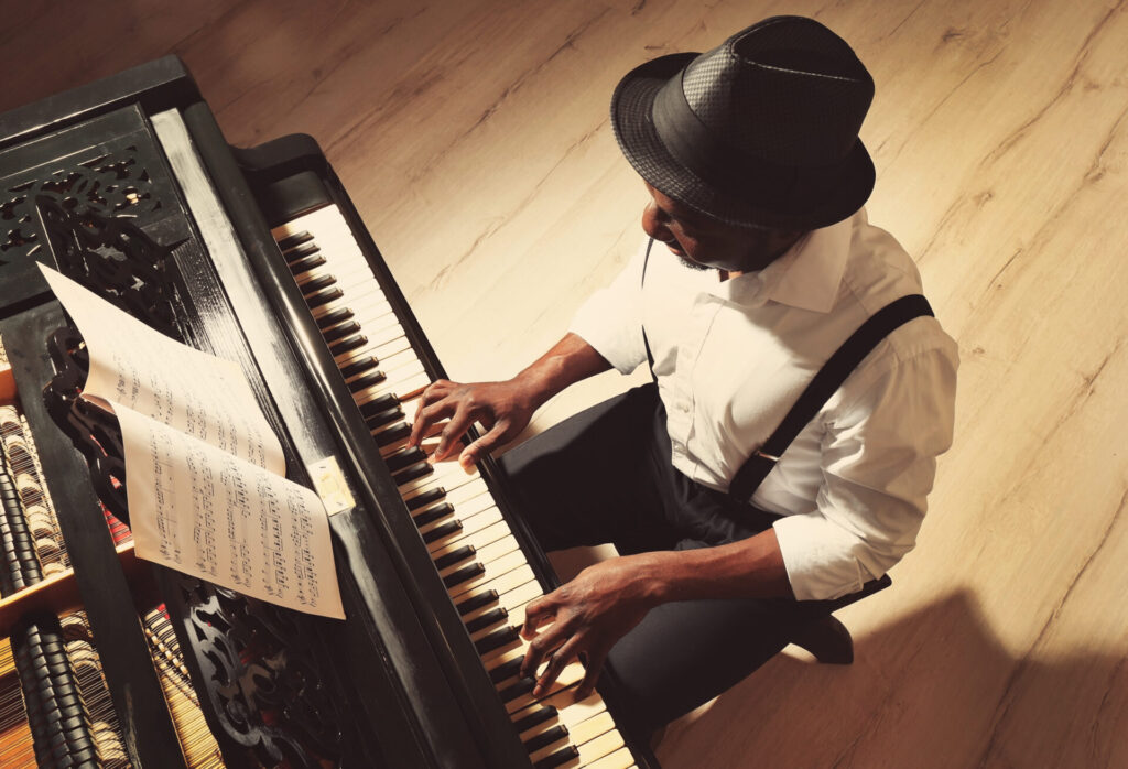 IELTS Arts and Entertainment – musician playing piano during practice.
