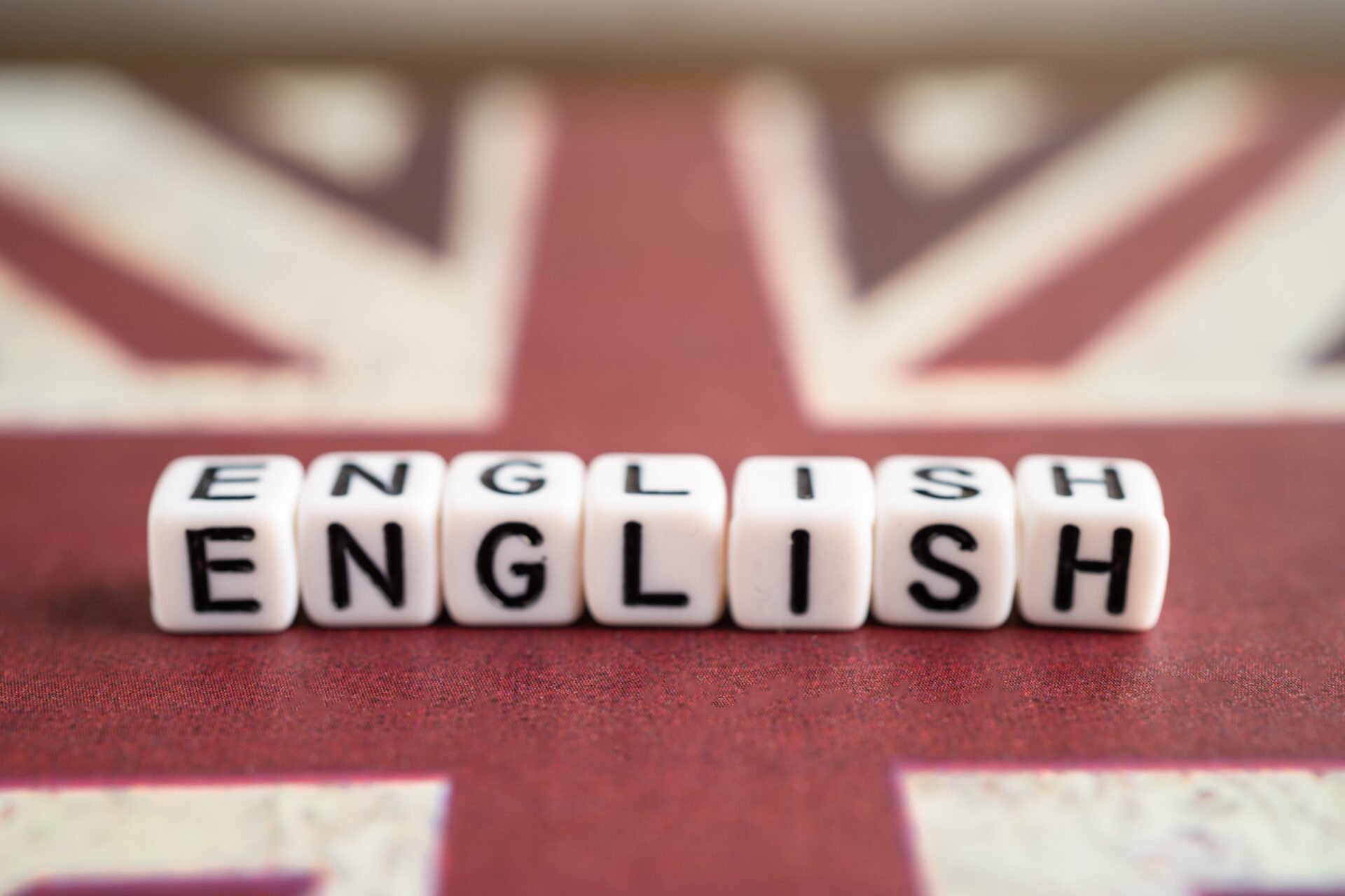 English letter blocks on a British flag used to promote English classes in Hua Hin