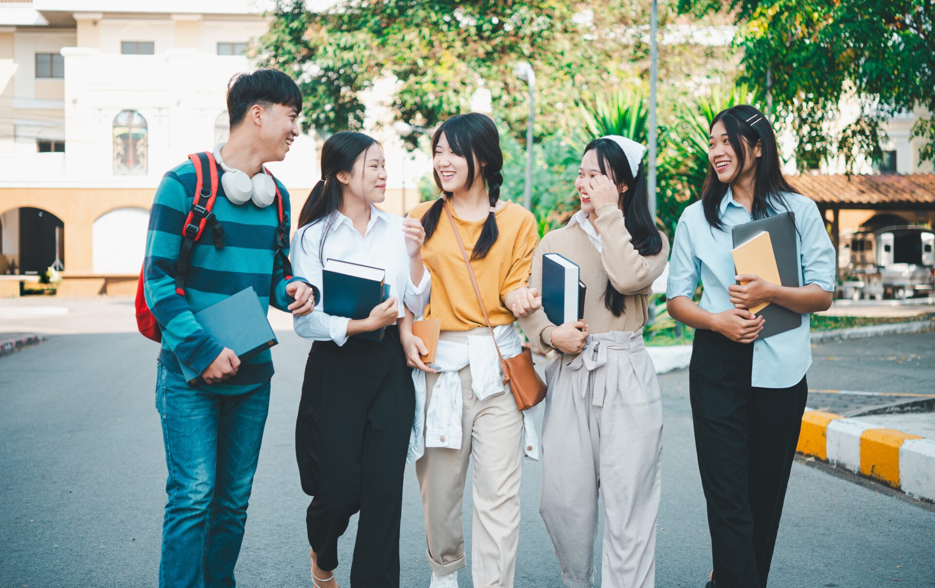 IELTS for study abroad group of students walking confidently on campus at ILC Hua Hin.